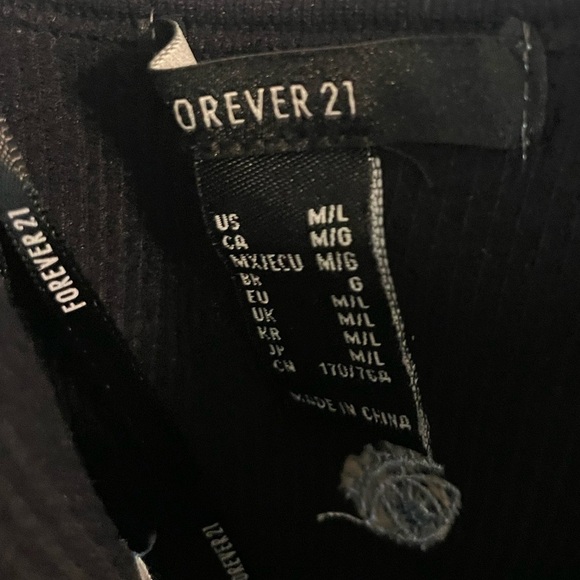 Forever 21 tight knit little dress with “eyes”! Size medium - Picture 2 of 3